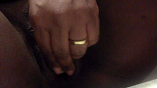 sparksxxx spreads wide for close-up ebony pussy toy play on cam