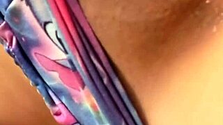 Hey watch this naughty girl shake her ass while rubbing her pussy hard