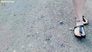 german chubby walks barefoot in birkenstocks through nature outdoors