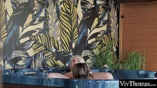 blondes share intimate jacuzzi kisses and caresses