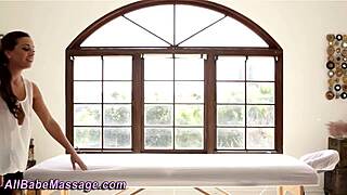 this hot lesbian babe gets fingered during steamy massage