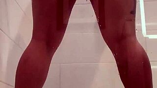 shower whore shoves monster dildo deep in her holes