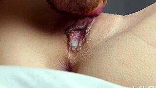 Her soaked slit quivers under eager tongue