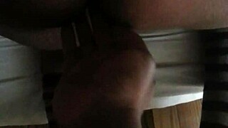 Black woman shows off her fat tattooed ass in close up