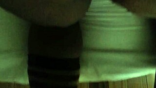 Black woman shows off her fat tattooed ass in close up