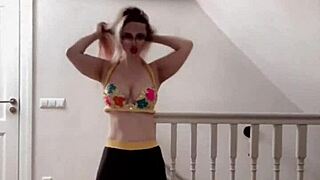 huge belly dancer goddess with glasses dances to music in celebrity fetish show